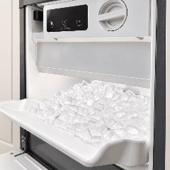 Ice Maker Repair — open ice maker with a full storage bin